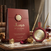 A luxurious product display of Mirsaal Love Letter Eau de Parfum, featuring the wax-sealed 100ml bottle next to its matching red gift box, decorative pens, and dried roses on a classic writing desk.